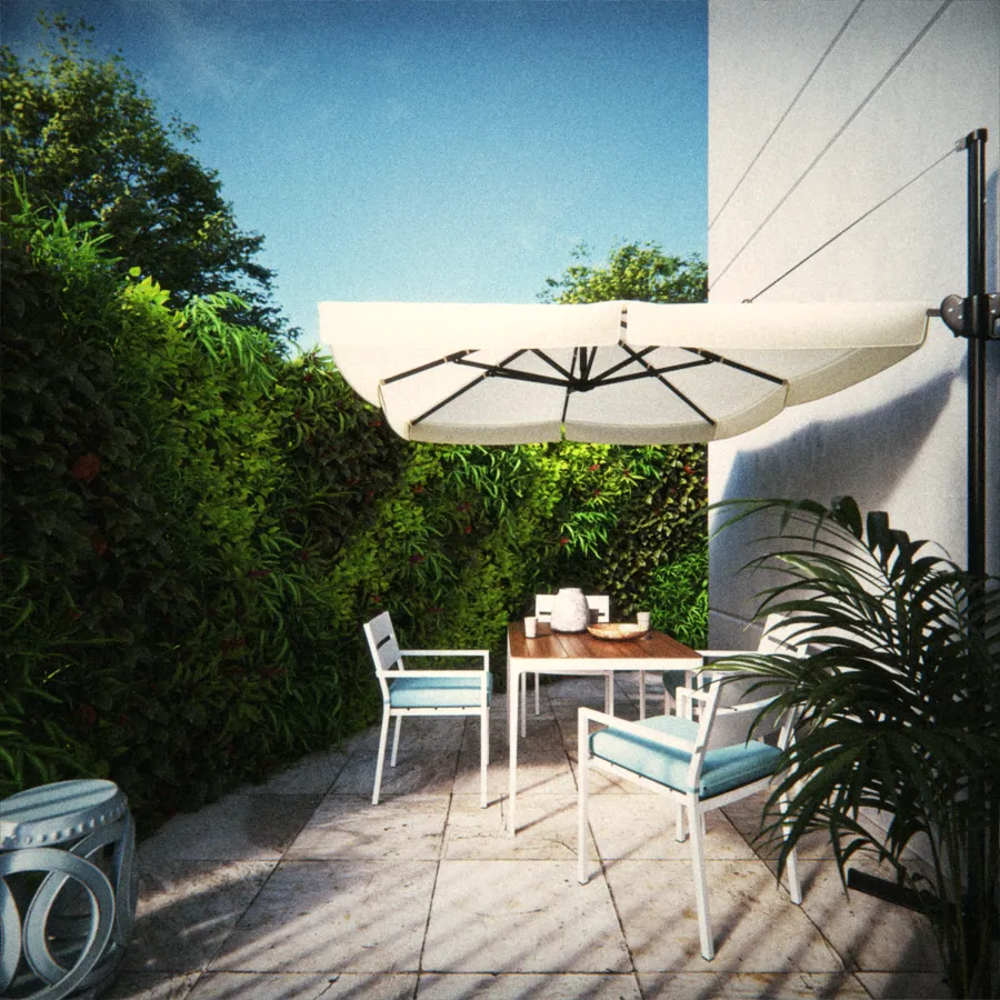 Garden de um apartamento térreo, com mesa e guarda-sol